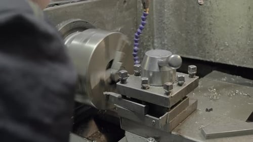 Industrial Drilling Machine on Factory Metal Parts Production Spinning on Metal Parts