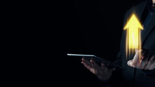 Man Using Tablet with Growing Business Chart