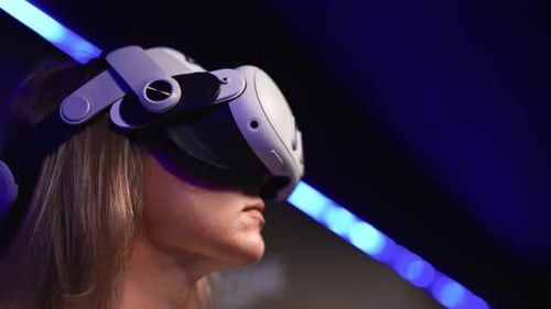 Woman Immersed in Virtual Reality with VR Headset