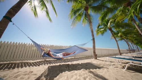 Woman Relaxing on a Hammock in Beautiful Key West Slow Motion