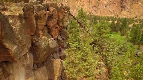 Aerial View of Rock Climber on Side of Oregon Mountain Above