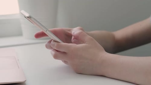 Cellphone in Hands of Child Closeup