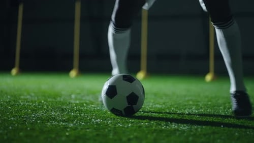 Soccer Player Kicking Soccer Ball Practicing Skills