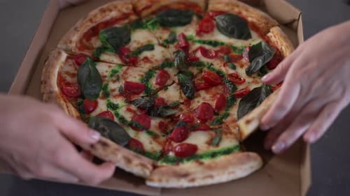 Pizza in Box, Multiple Hands Taking Slices