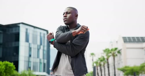 Stretching, fitness and training with black man in city for sports, start and muscle