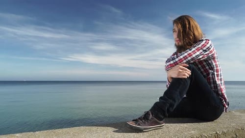 Man Long Haired Alone Sad on Sea