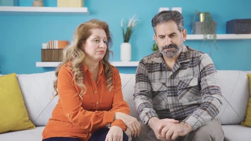 Couple Talking and Supporting Each Other Indoors