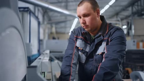 Laborer Cutting Wooden Details By Automated Sawing Machine in Plant Workshop Portrait Working Man