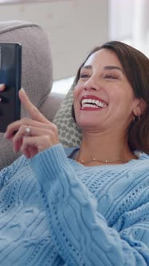 Relax, phone and woman on couch laughing for funny joke, meme and social media post on living room