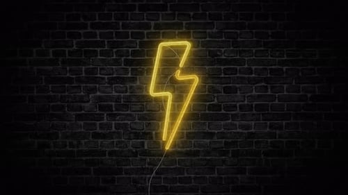 Panneau d'éclair à LED au néon sur un mur de briques