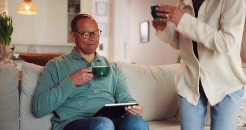 Happy Couple Enjoying Coffee Together at Home