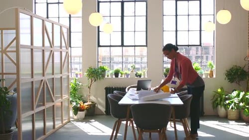 Architecture woman, blueprint planning and design studio project for building