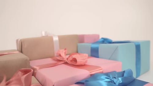 Pile of Colorful Wrapped Gifts with Ribbons