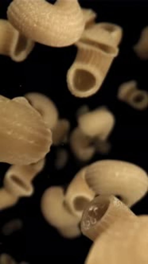 Dry Pasta Flies Down Filmed on a Highspeed Camera at 1000 Fps