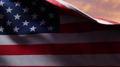 American Flag Waving at Sunset on Independence Day
