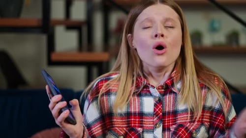 Front View Portrait of Furious Angry Young Woman Dissatisfied with Phone Message Gesturing Inhaling