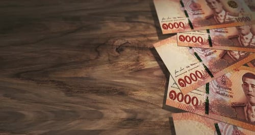 Thai Baht 1000 THB money banknotes background loop