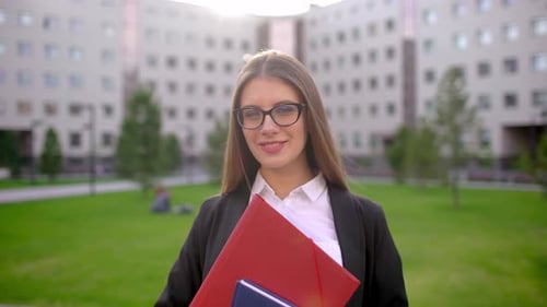 Woman Student Outdoors Smiling Education Businesswoman on Background of Campus University