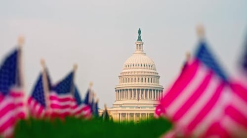 Capitol Building National Symbol Patriotism American Flag Waving at Capitol Washington DC Capitol