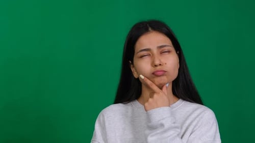 Deep in Thought Pensive Woman in a Studio Her Thoughtful Expression Reflecting Moments of