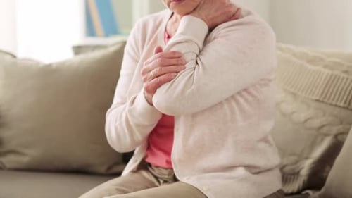 Woman Massaging Sore Elbow Arm Pain Relief