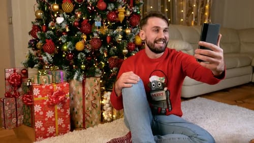 Man Video Calling at Christmas Time
