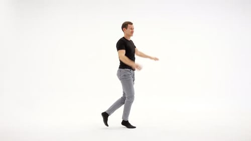 Man Dancing on a White Background in Studio