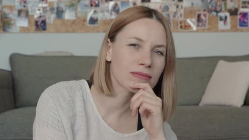 Fair-Skinned Woman Contemplating Indoors