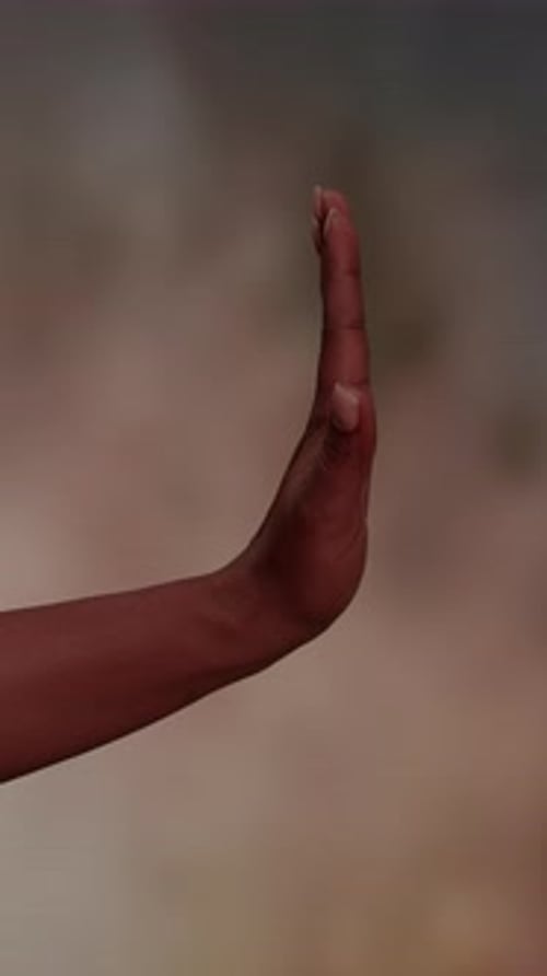 Close Up of Arm and Hand Held Vertically