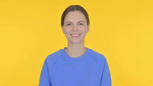Young Adult Woman Smiling and Winking