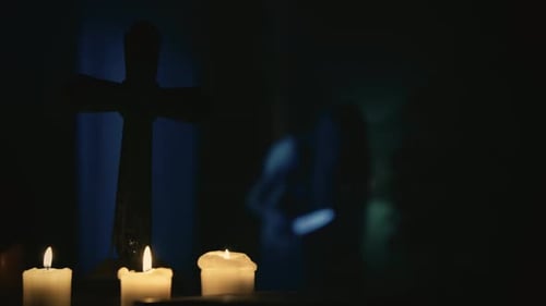 Video Capturring a Blurry Possessed Female Ghost Entity with a Knife in Her Hand Hunched Over and