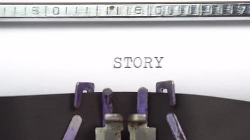 Typewriter Types the Word "Story" on Paper