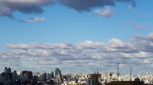 City Beneath Dramatic Cloudscape