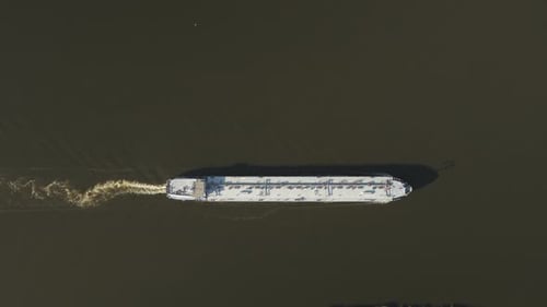 Oil tanker navigates waters, transporting crude oil to global markets while fueling energy demands