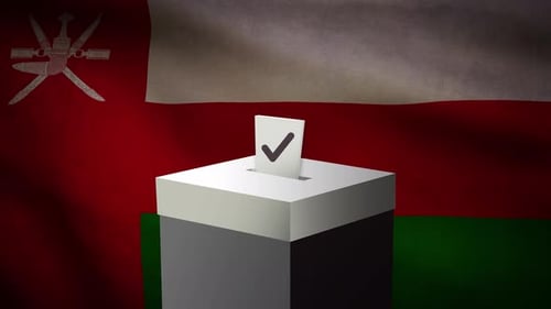 Casting vote into the ballot box during Oman election