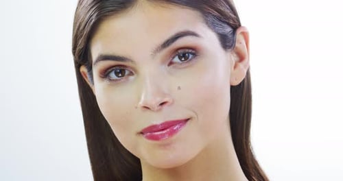 4k video footage of an attractive young woman posing in studio