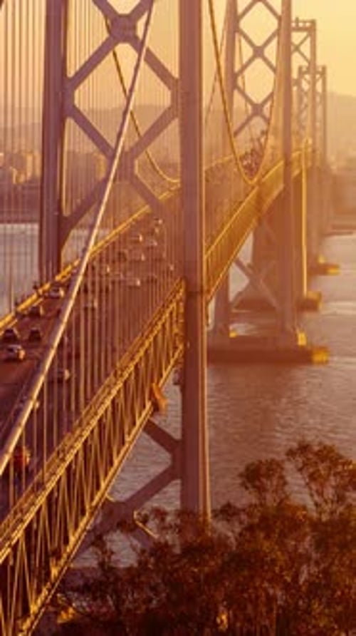 Traffic on San Francisco's Bay Bridge at Sunset. Vertical Video.