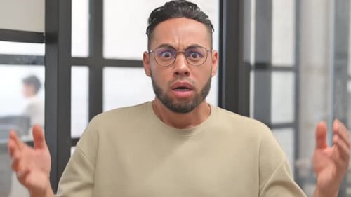 Man Expresses Disagreement by Shaking His Head