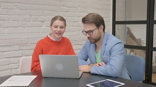 Business Colleagues on Video Call in Modern Office