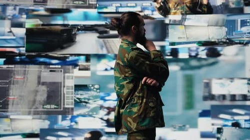 Soldier Standing in Front of Video Wall