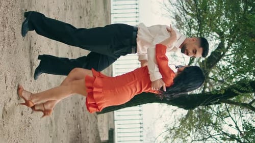 Passionate Latino Couple Dancing Park in Summer Vertical Pair Performing Salsa