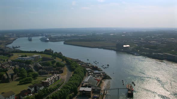 Drone footage of the River Tyne featuring ships, buildings, and a wide ...
