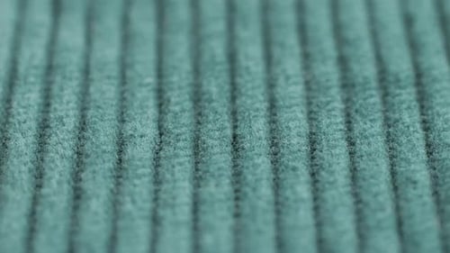 Textured Wavy Blue-Green Fabric Close Up
