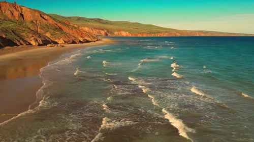 Aerial view of seascape along the vast beach on the South Coast during summer