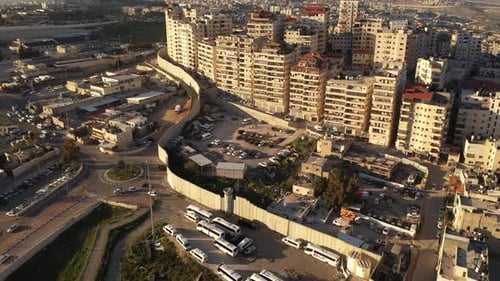 Anata Refugees Camp with security wall and idf watch tower- aerial view
