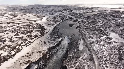 Selfoss waterfall Iceland | winter aerial view of volcanic arctic river landscape