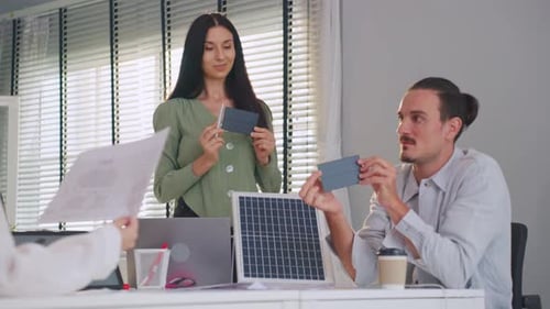 Group of young businessman and businesswoman working in the office.