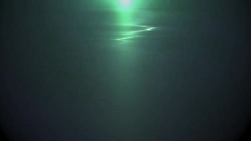 Green Light Shimmering Abstract Reflection Motion Background