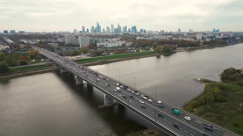 Aerial drone top view of highway multilevel junction in urban populated area, City panorama backgrou