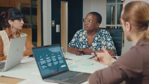 Female Manager Explaining Business Tasks on Office Meeting